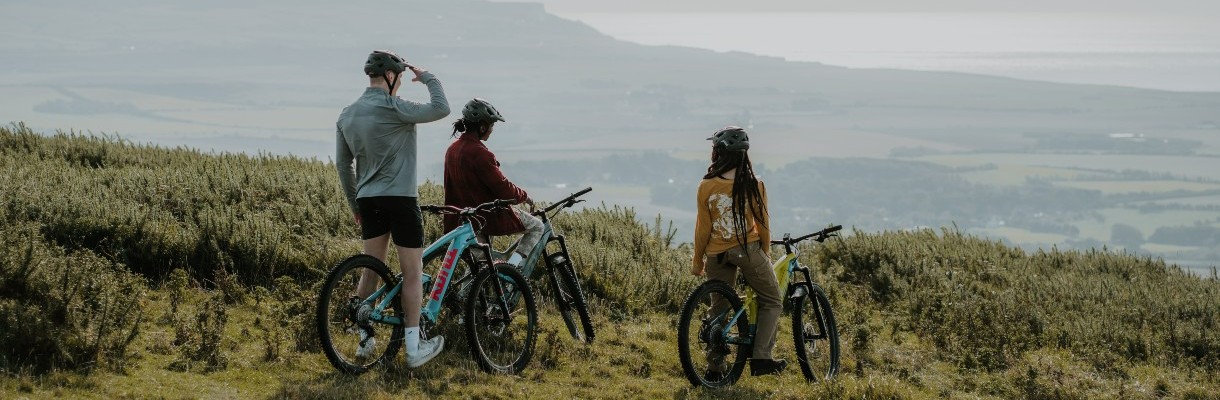 Friends mountain biking on the Isle of Wight